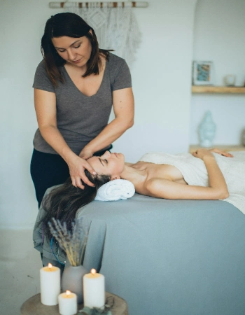Professional head massage therapy by female therapist during home massage service in Mumbai